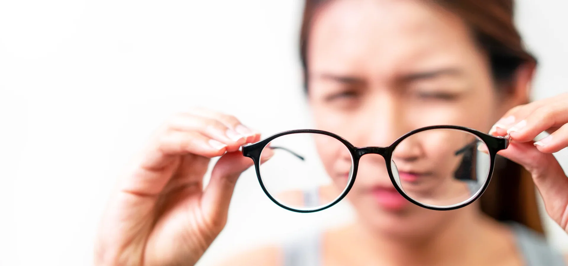 Optometrist reviewing axial length results with a child at Eyecare Concepts Melbourne